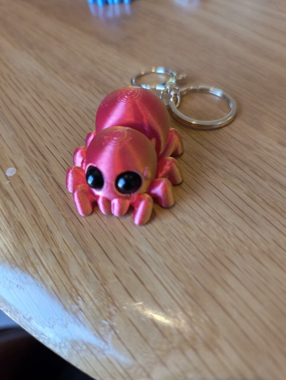 Color-Shifting Pink/Gold Spider Keychain - Picture 2 of 3